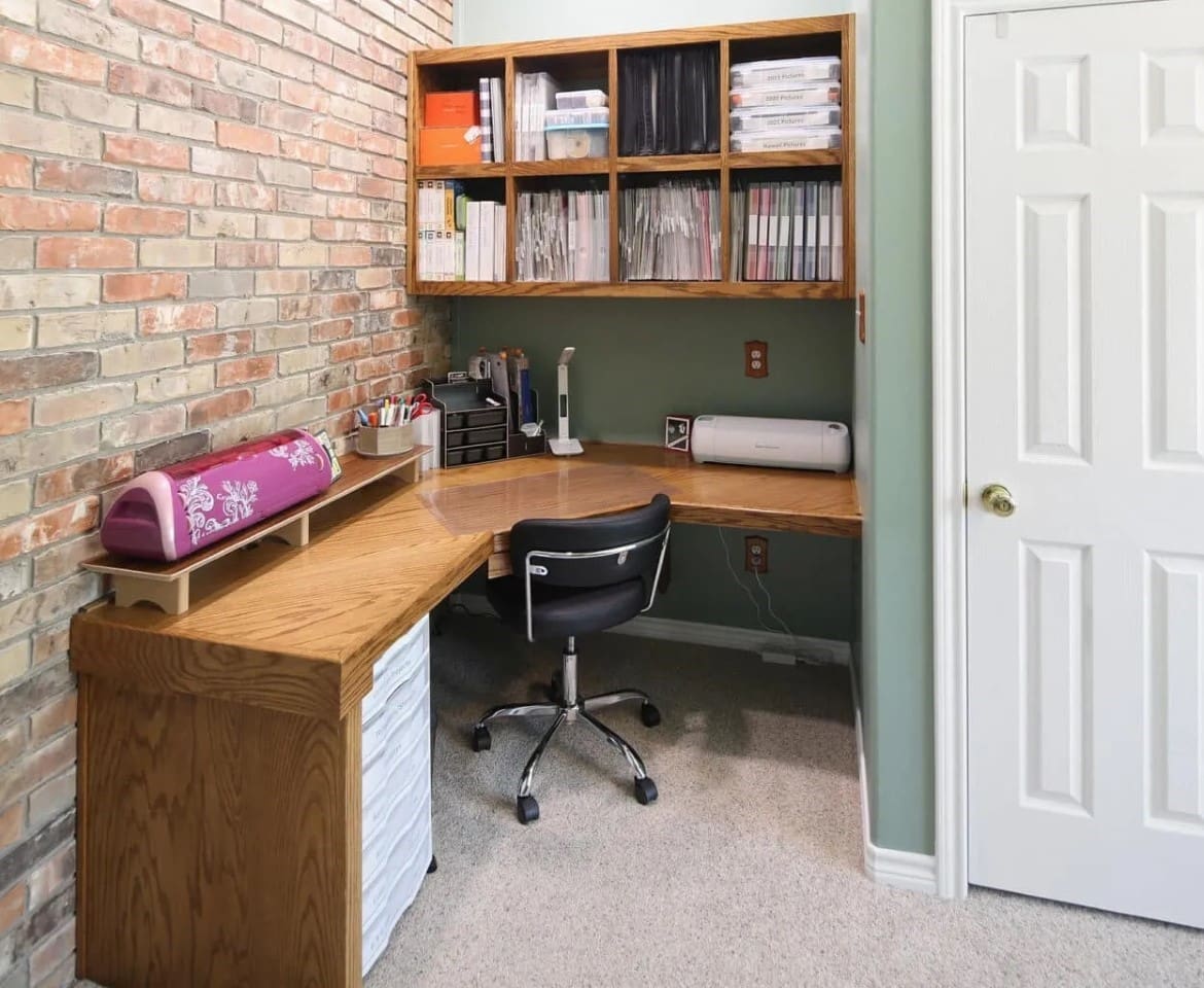 A room with a desk and chair in it