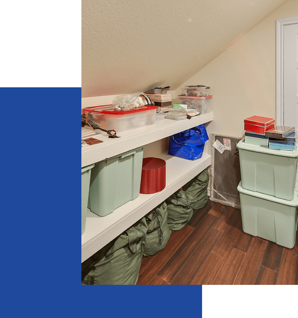 A room with two shelves and three bins.